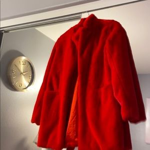 Red faux fur coat